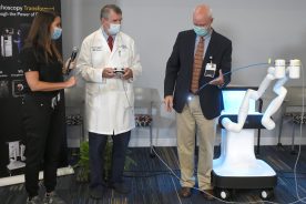 Nelson Greene, MD, conducts a robotic bronchoscope simulation.