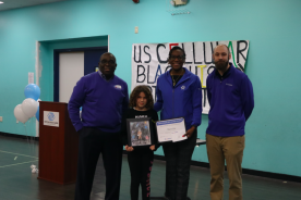 Pictured here from left to right, from UScellular, Bertram Daniels; First Place Winner of the 16th Annual Black History Month Art Contest, Aurelia Stoval, 8 from Rocky Mount and Nakeita Stewart and Darren Chilson from UScellular.