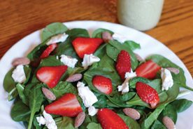 Strawberry and Goat Cheese Salad with Toasted Almonds and Creamy Avocado Dressing